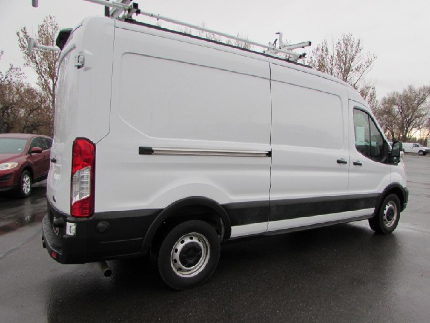 2020 White /Black Ford Transit 350 (1FTBW9C86LK) with an 3.5L PFDI V6 Gas engine, 10 speed Automatic transmission, located at 4562 State Avenue, Billings, MT, 59101, (406) 896-9833, 45.769516, -108.526772 - 2020 Ford Transit 350 Van Medium Roof 148-in. WB Cargo Van - One owner! 3.5L PFDI Gasoline V6 - 10 speed automatic transmission - rear wheel drive - 117,088 miles - One owner - Inspected and serviced - copy of inspection and work performed as well as a full vehicle history report provided Air - Photo#3